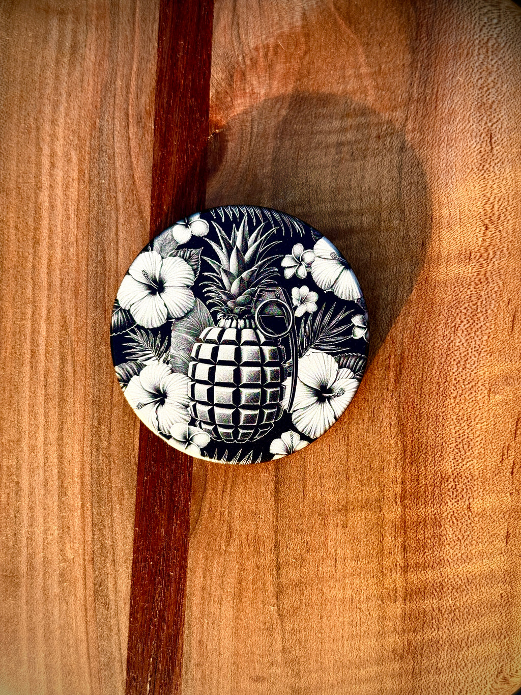 Metal Zyn Can for nicotine pouches with floral and pineapple grenade engraved design. With integrated bottle opener. 