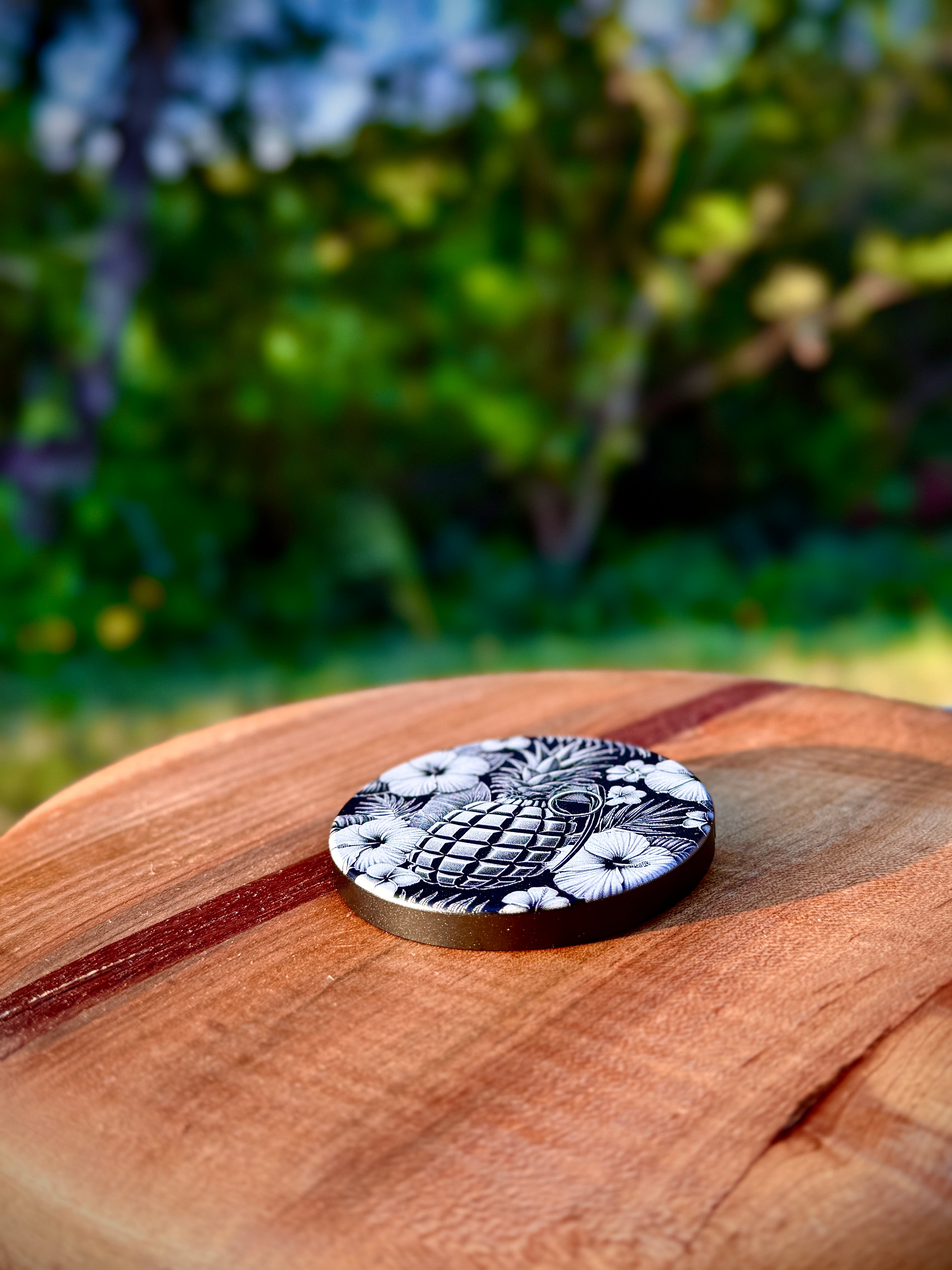 Metal Zyn Can for nicotine pouches with floral and pineapple grenade engraved design. With integrated bottle opener. 