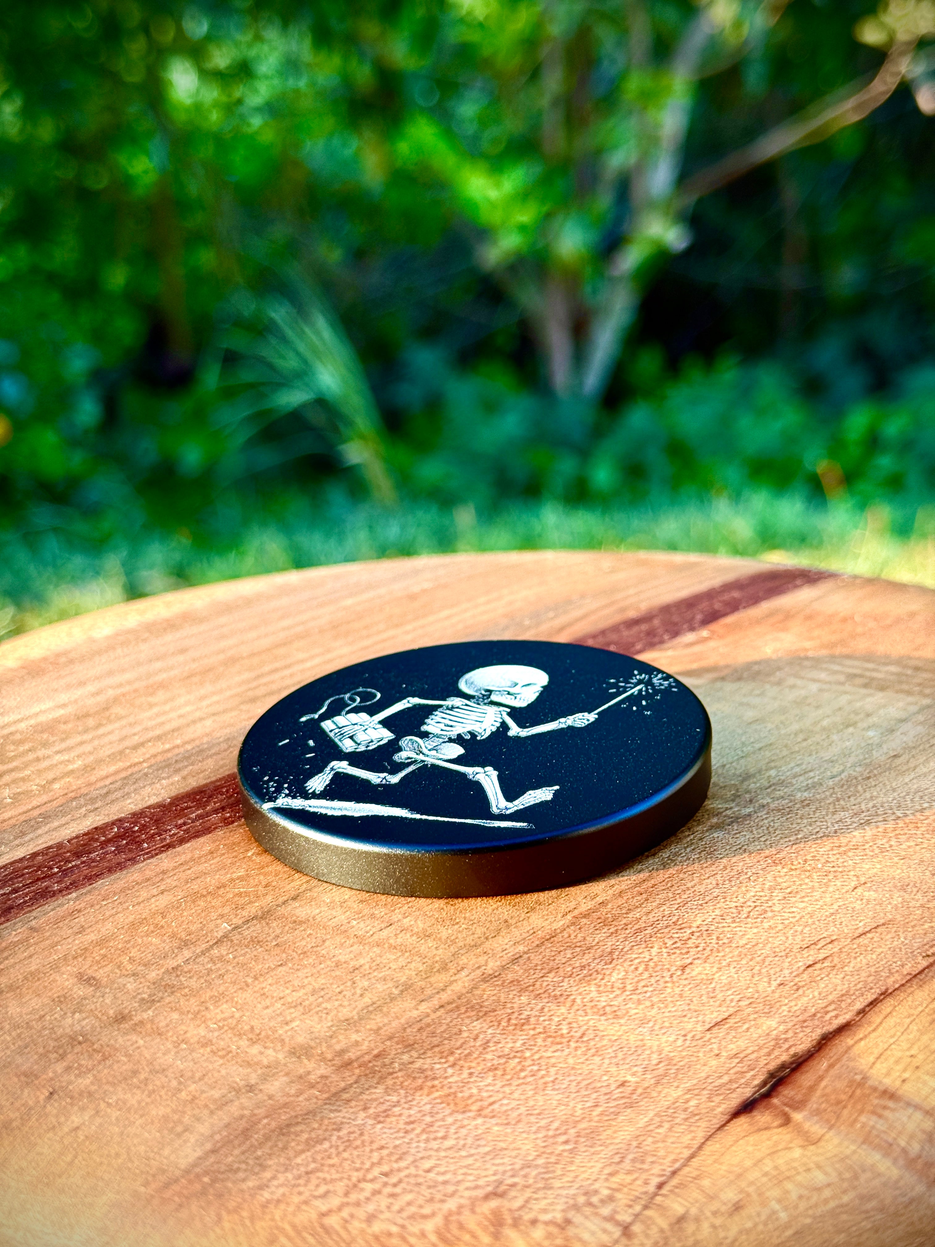 Metal Zyn Can for nicotine pouches with Skeleton carrying a sparkler and dynamite engraved design. With integrated bottle opener. 