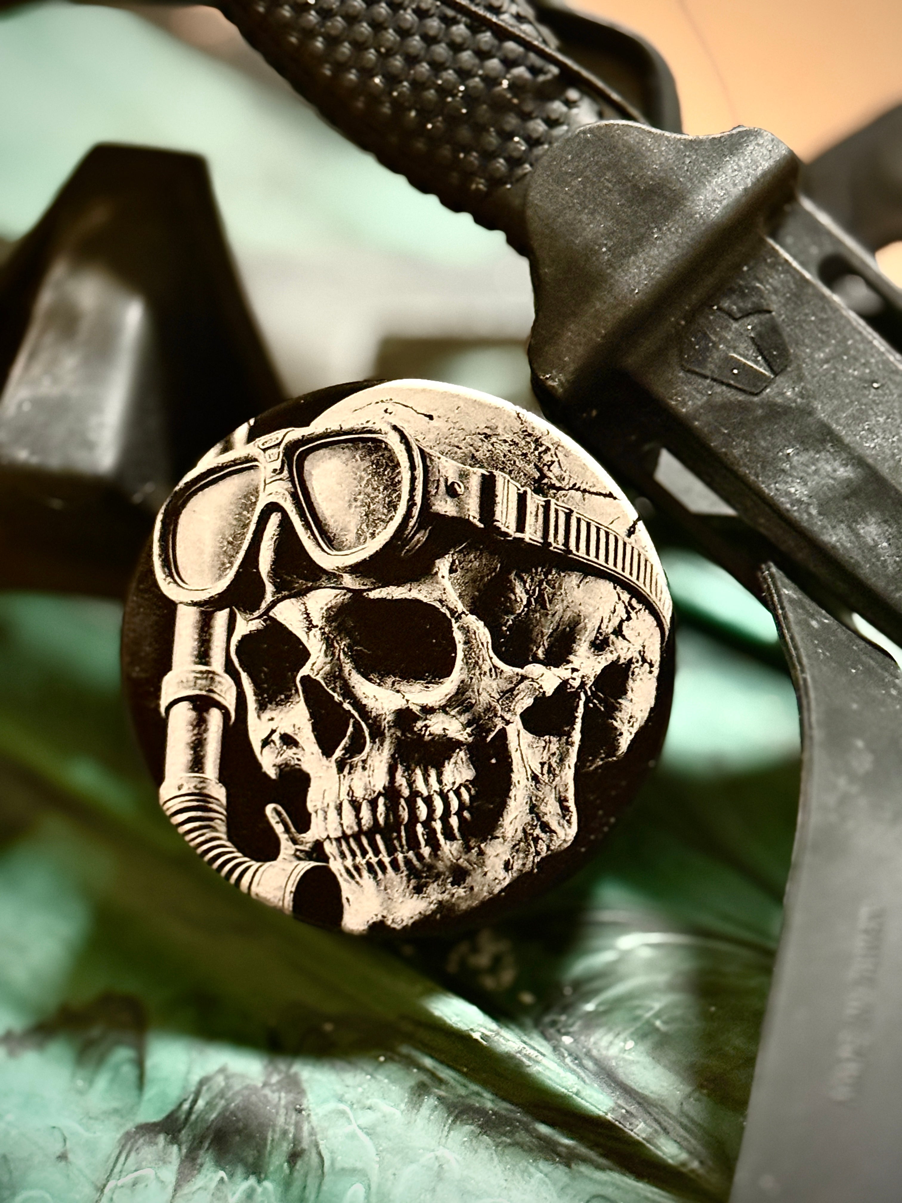 Metal Zyn Can for nicotine pouches with engraved design of skull in dive gear. With integrated bottle opener. 