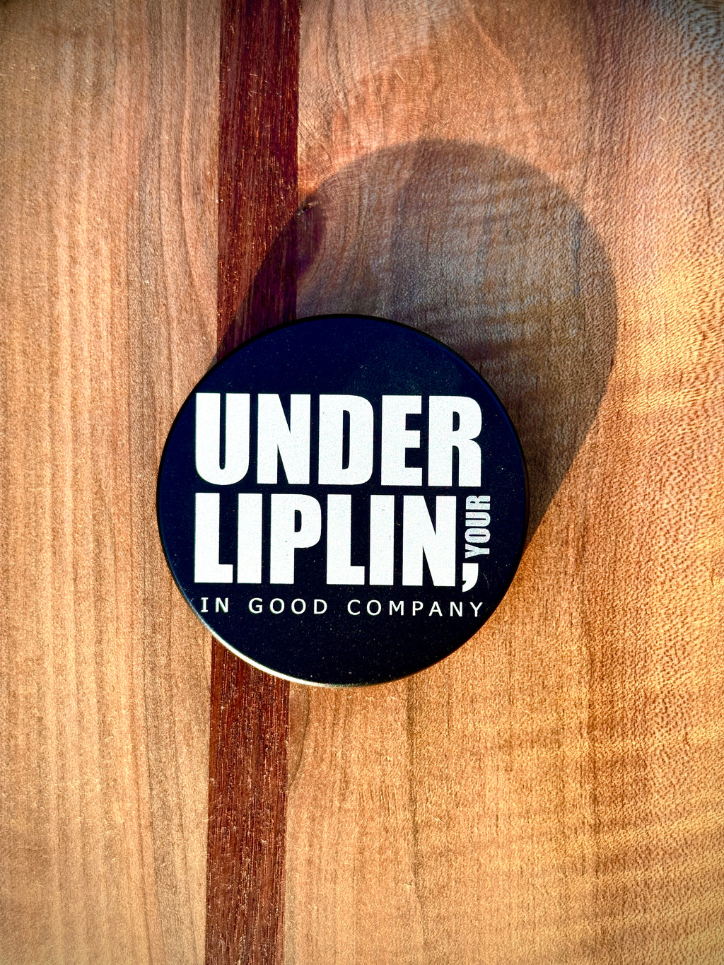 Metal Zyn Can for nicotine pouches with "Under Liplin" play on "Dunder Mifflin" engraved design. With integrated bottle opener. 