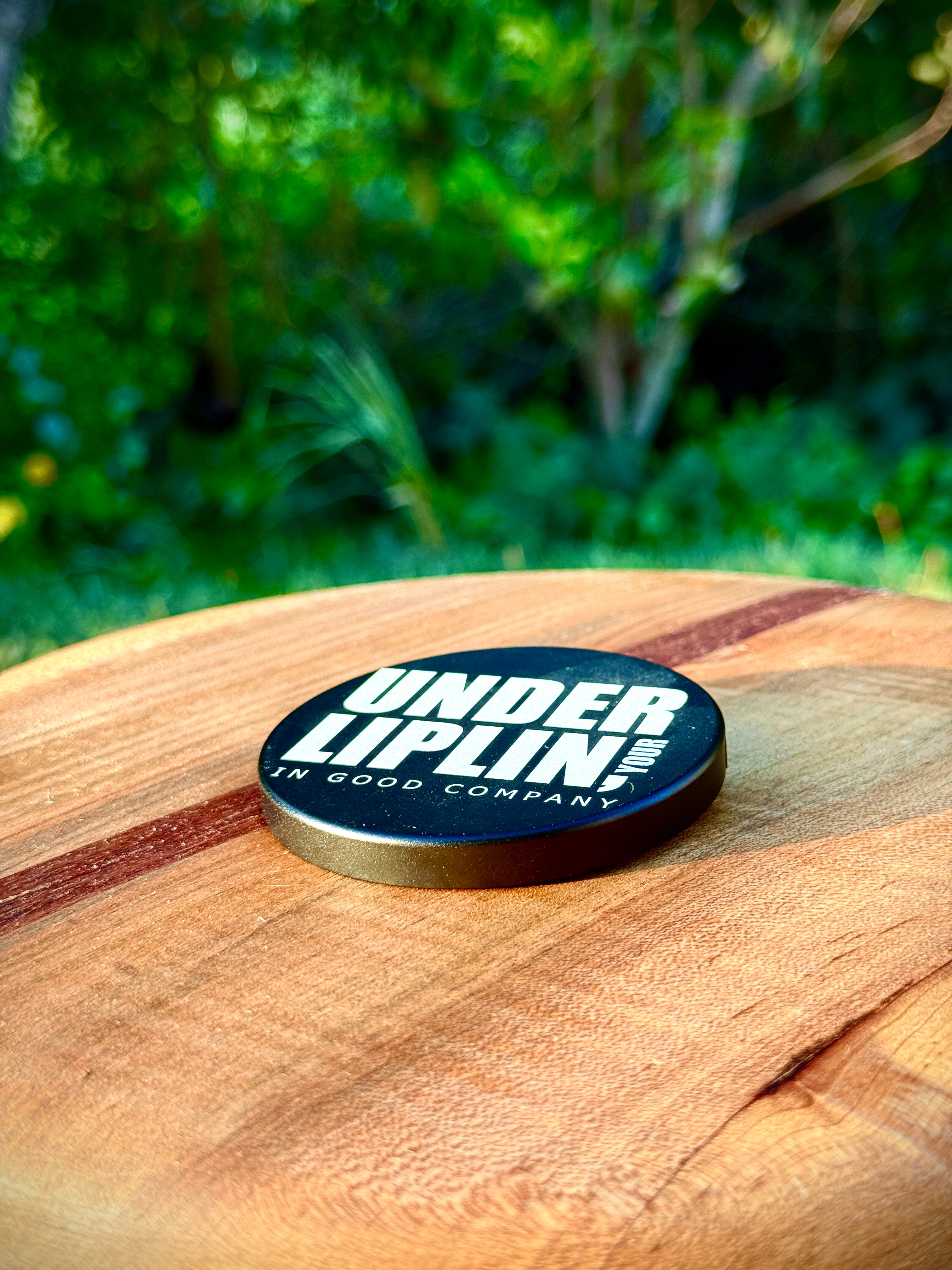 Metal Zyn Can for nicotine pouches with "Under Liplin" play on "Dunder Mifflin" engraved design. With integrated bottle opener. 