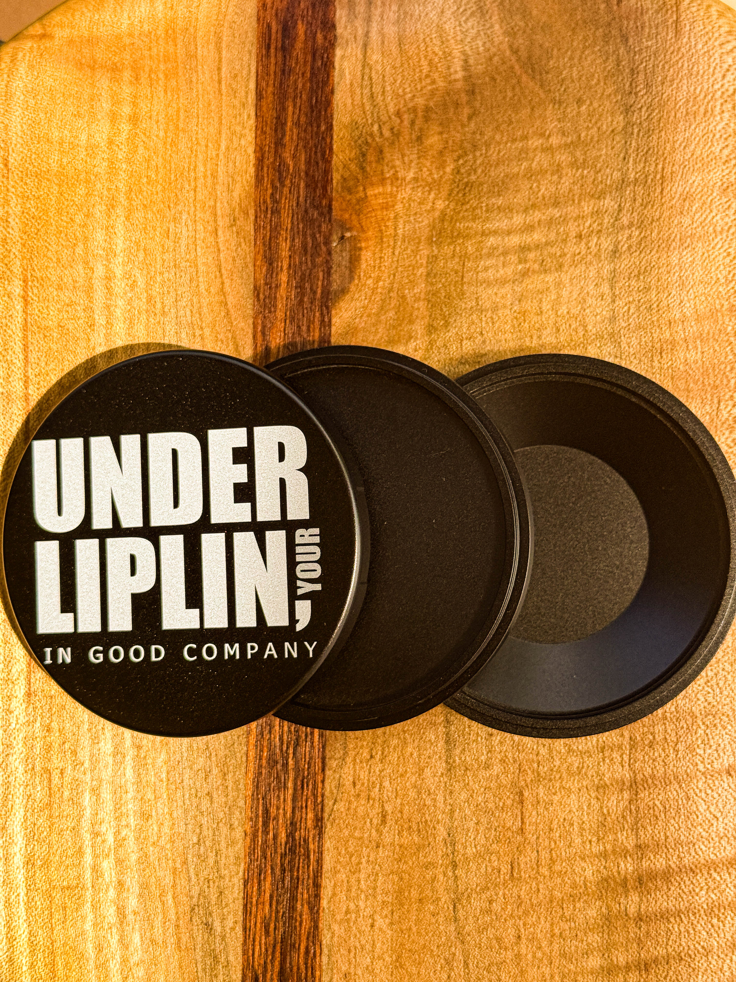 Metal Zyn Can for nicotine pouches with "under liplin" play on "Dunder Mifflin" engraved design. With integrated bottle opener. 