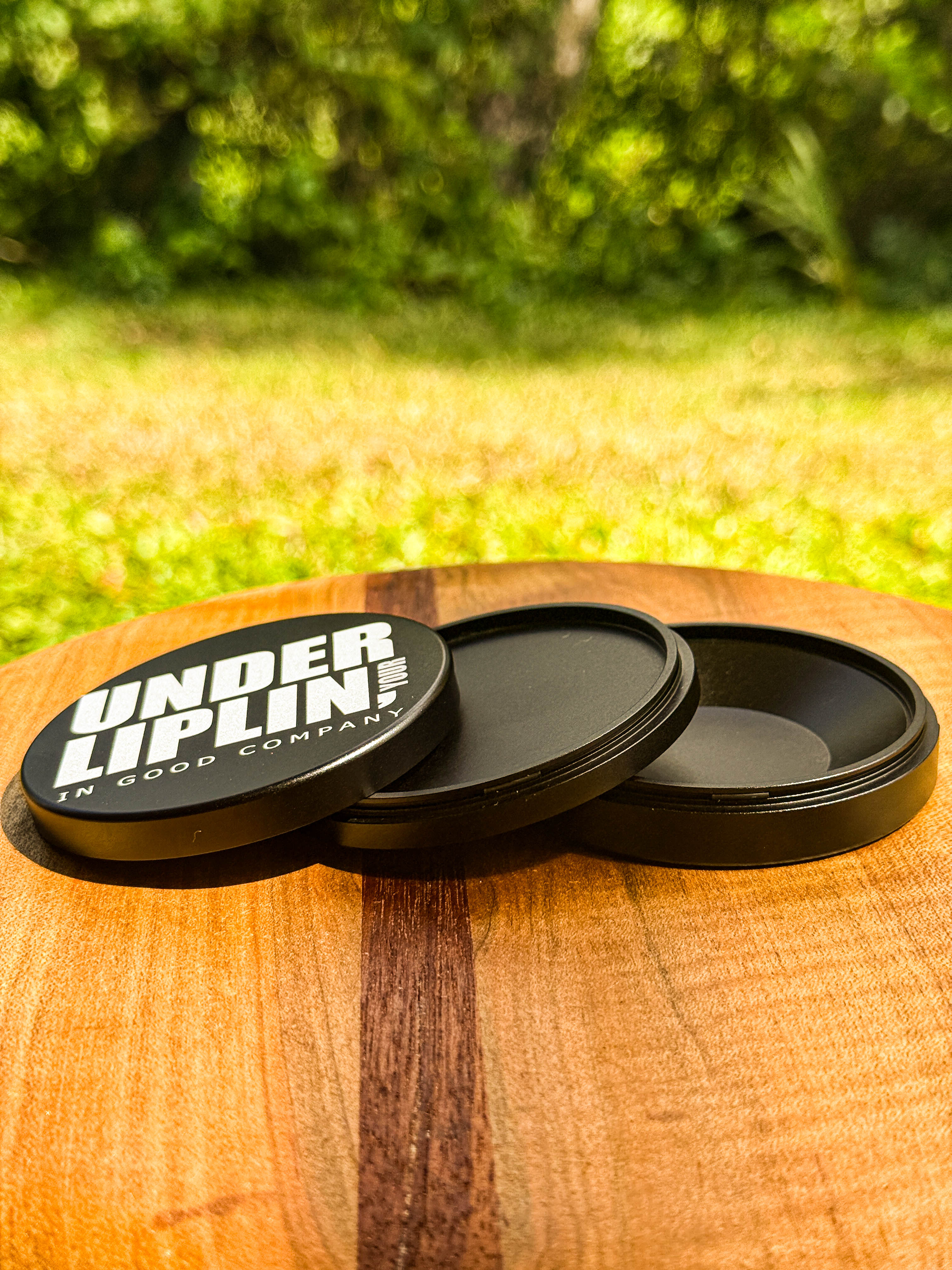 Metal Zyn Can for nicotine pouches with "under liplin" play on "Dunder Mifflin" engraved design. With integrated bottle opener. 